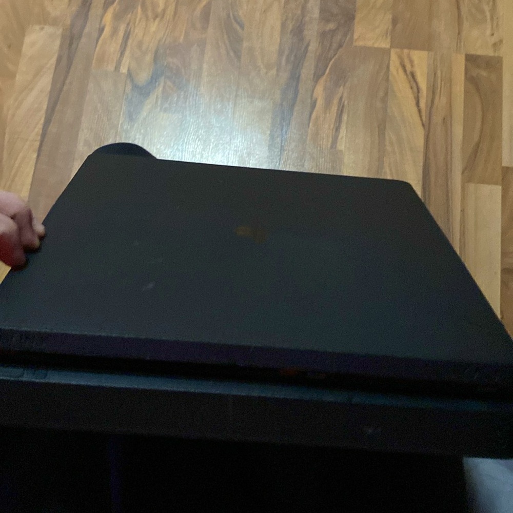 PlayStation 4 slim +  remote/cords. Great condition, few scratches, runs great.